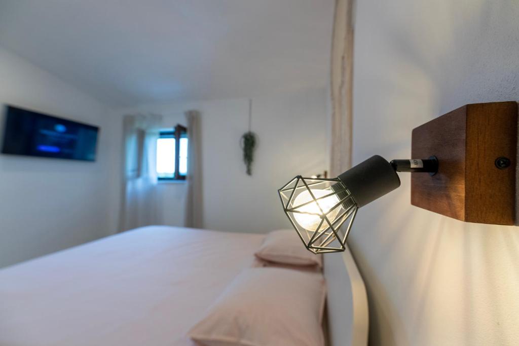 Postel nebo postele na pokoji v ubytování 4 ELEMENTS - Luxury Family Apartments