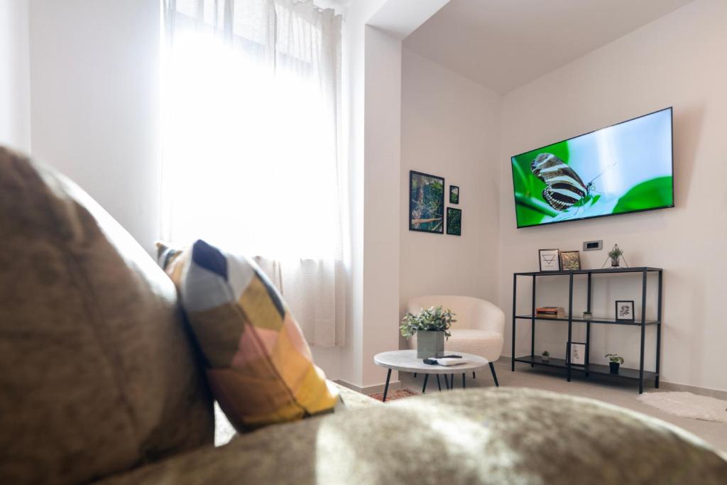 TV a/nebo společenská místnost v ubytování 4 ELEMENTS - Luxury Family Apartments