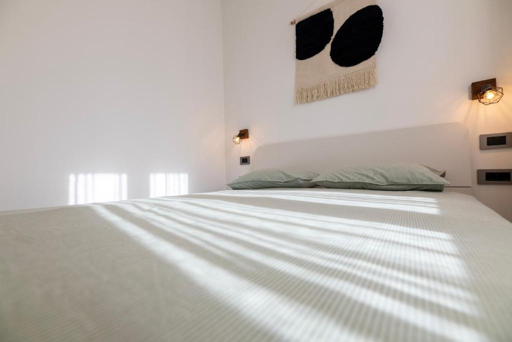 Postel nebo postele na pokoji v ubytování 4 ELEMENTS - Luxury Family Apartments