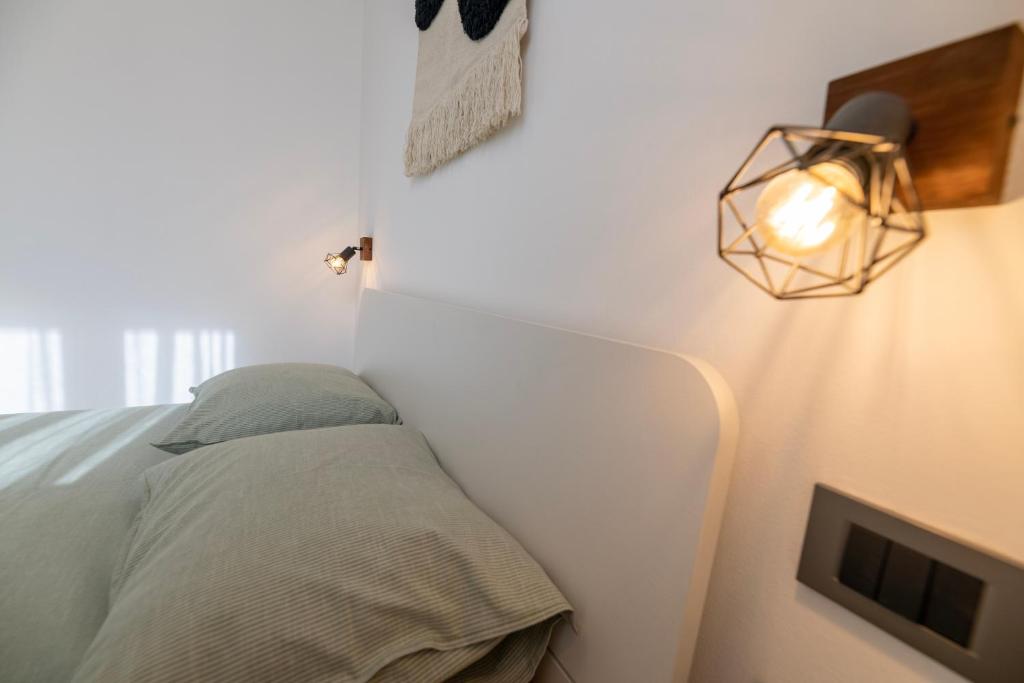 Postel nebo postele na pokoji v ubytování 4 ELEMENTS - Luxury Family Apartments