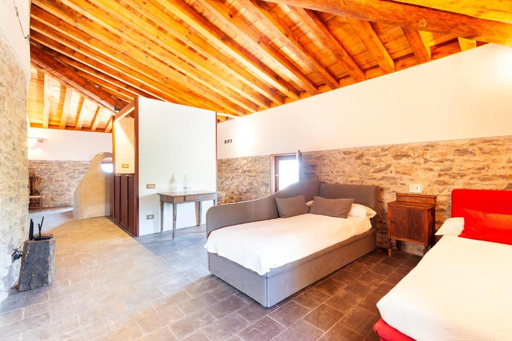 Postel nebo postele na pokoji v ubytování Casa Fumanal - Unique Property for up to 24