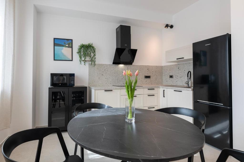 Kuchyň nebo kuchyňský kout v ubytování 4 ELEMENTS - Luxury Family Apartments
