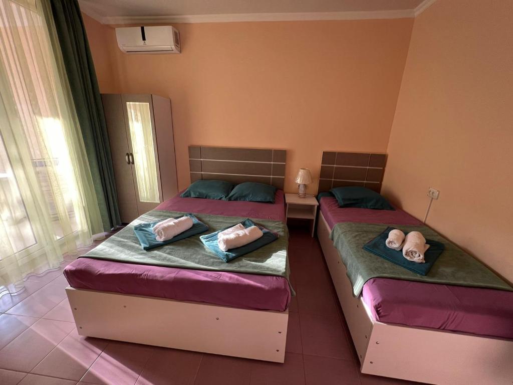 Postel nebo postele na pokoji v ubytování Imeri Hotel