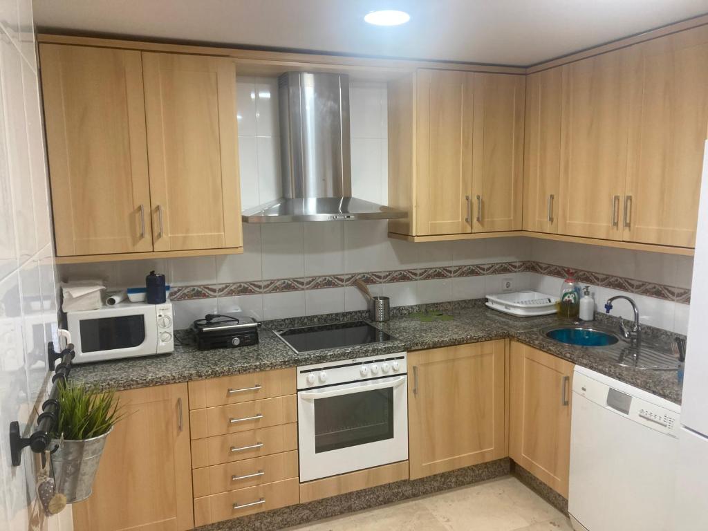 Kuchyň nebo kuchyňský kout v ubytování Big Terrace Benalmadena