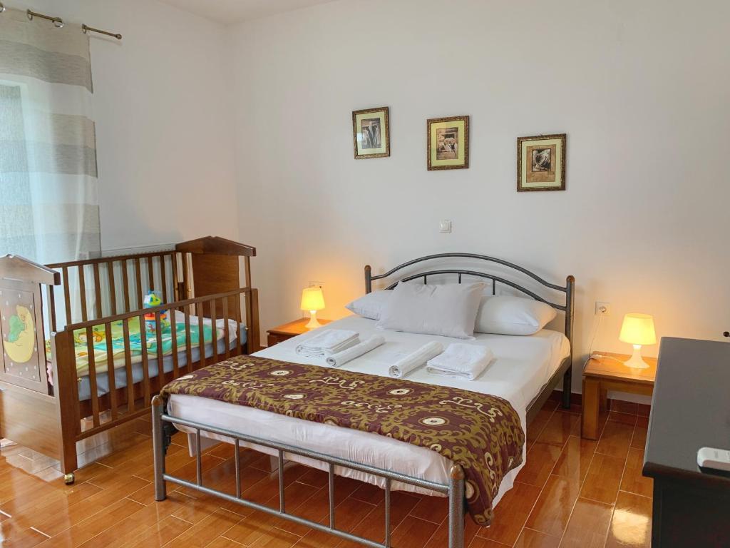 Postel nebo postele na pokoji v ubytování Evaggelias Home Gavalochori