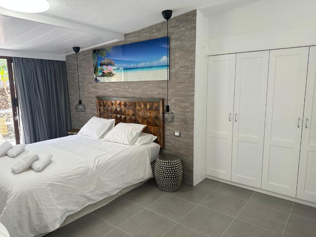 Postel nebo postele na pokoji v ubytování Apartamentos Finca Wapa