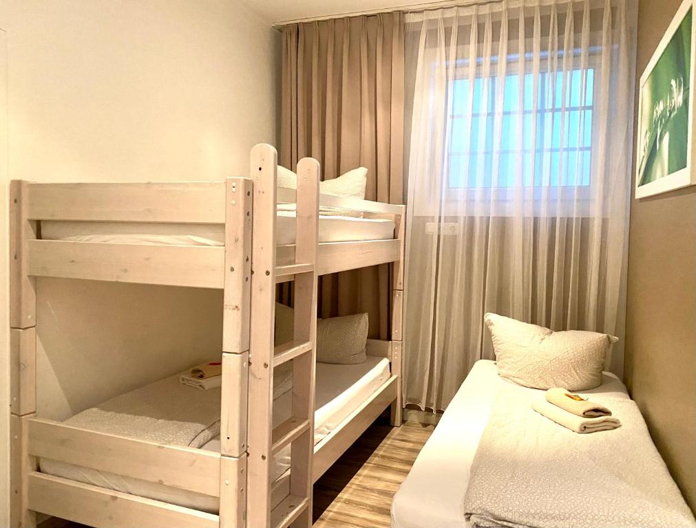 Postel nebo postele na pokoji v ubytování Wilsmann Apartmentvermietung