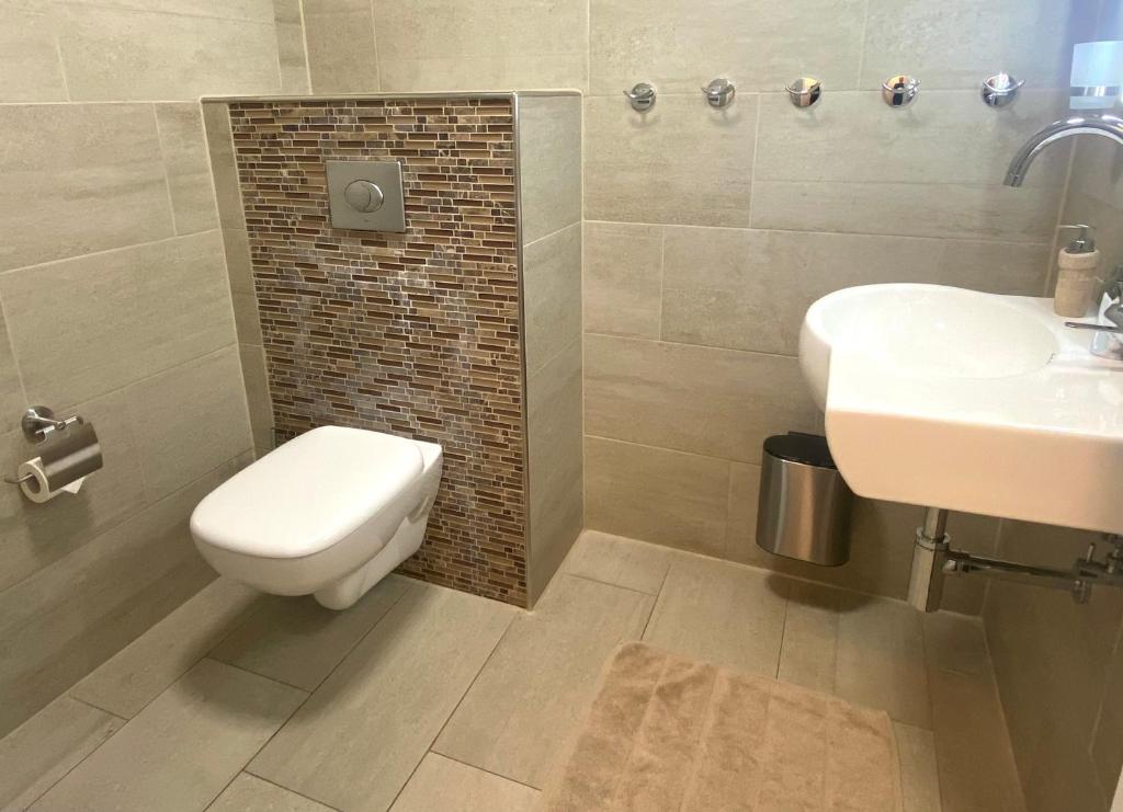 Koupelna v ubytování Wilsmann Apartmentvermietung