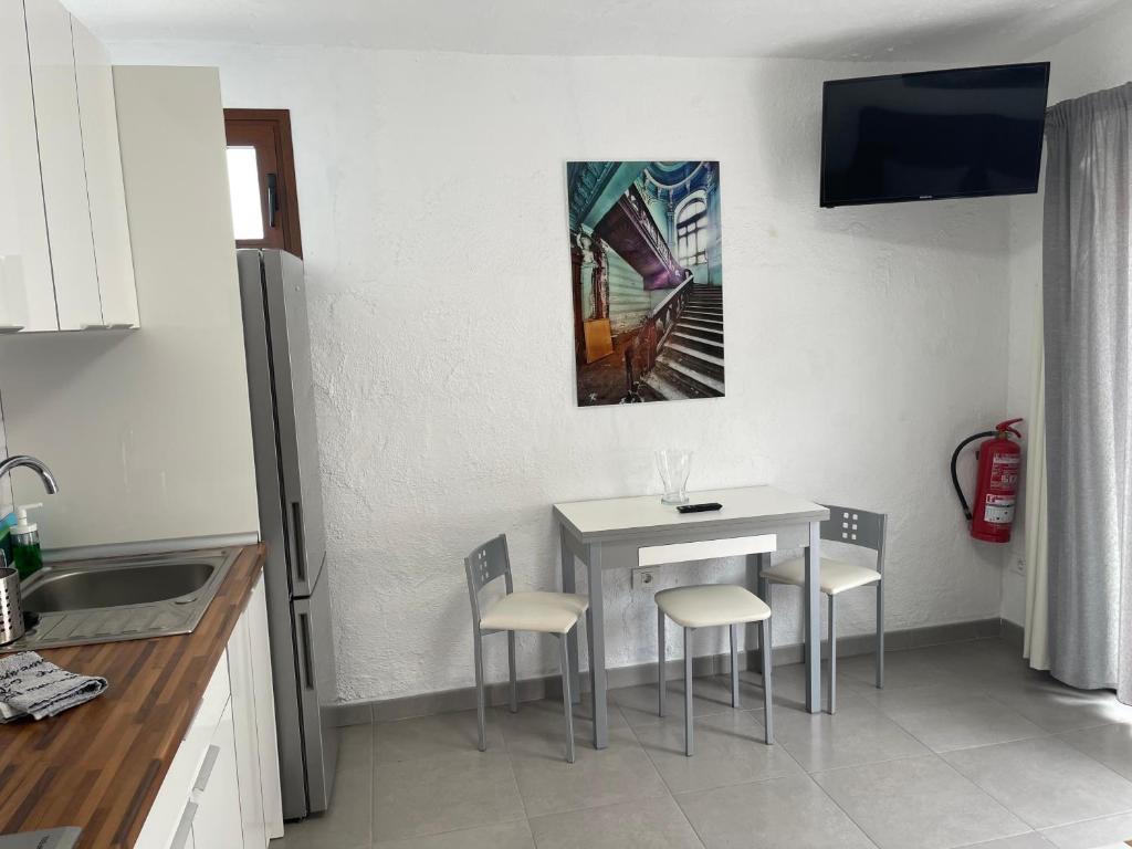 Kuchyň nebo kuchyňský kout v ubytování Apartamentos Finca Wapa