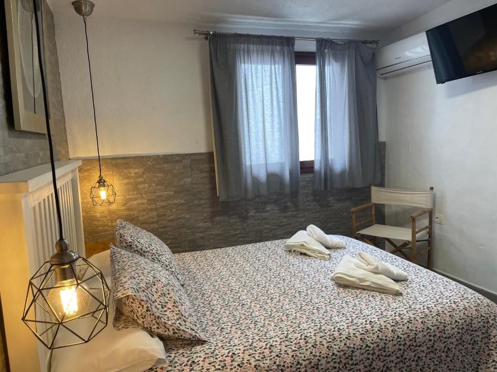 Postel nebo postele na pokoji v ubytování Apartamentos Finca Wapa