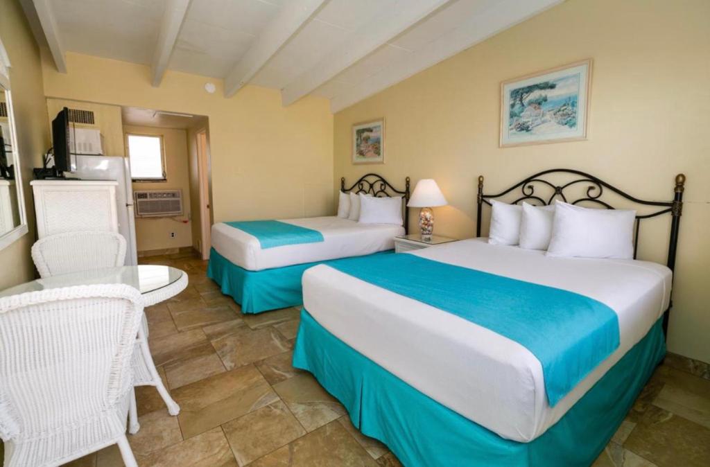 Postel nebo postele na pokoji v ubytování Aztec Motel Wildwood Crest Beach