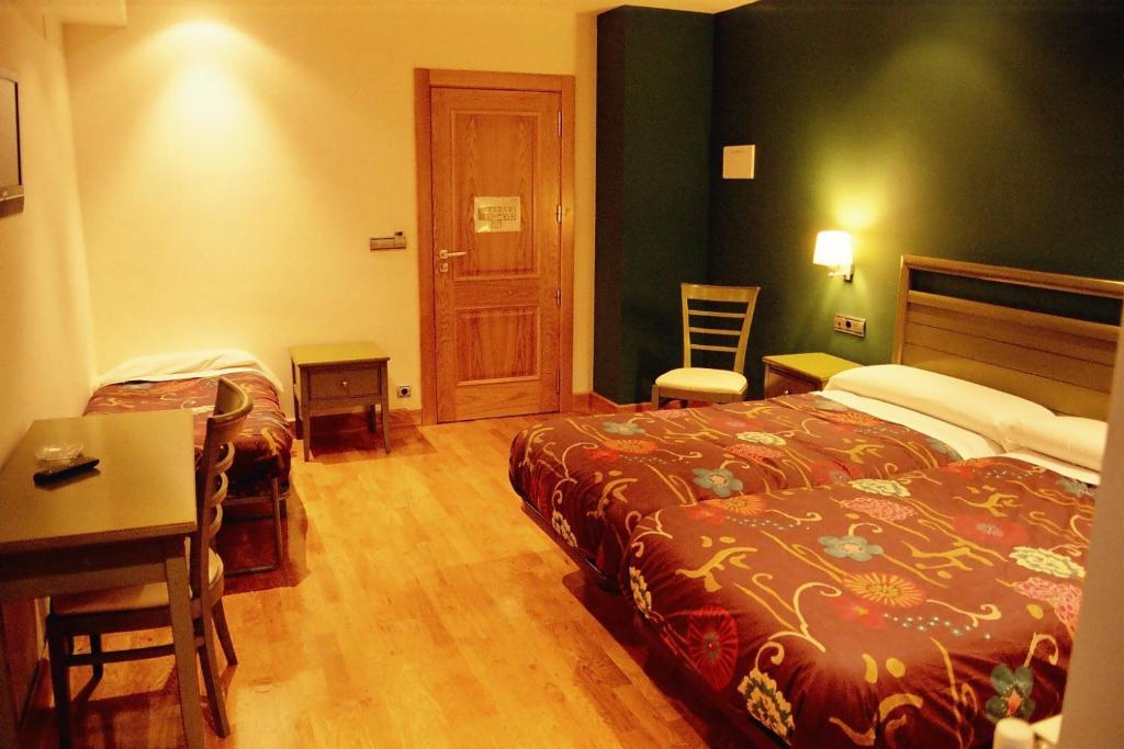 Postel nebo postele na pokoji v ubytování Hostal Rural Haizea