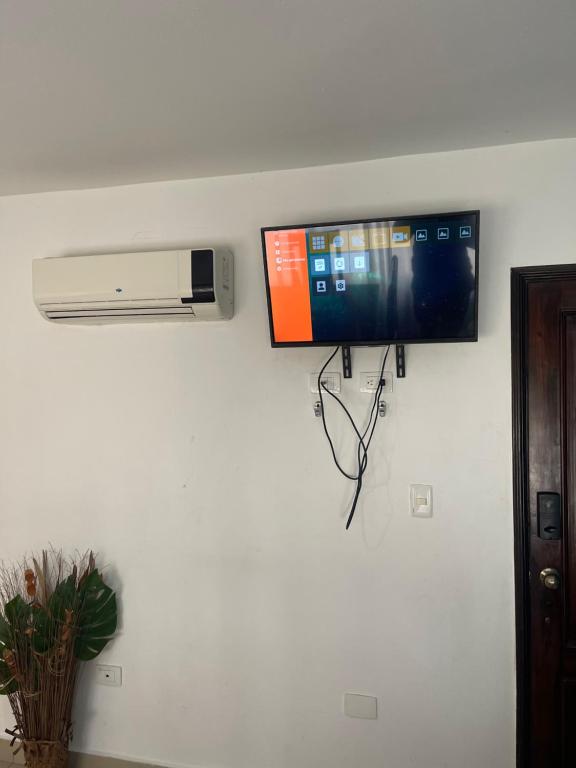 TV a/nebo společenská místnost v ubytování Promoviviendas
