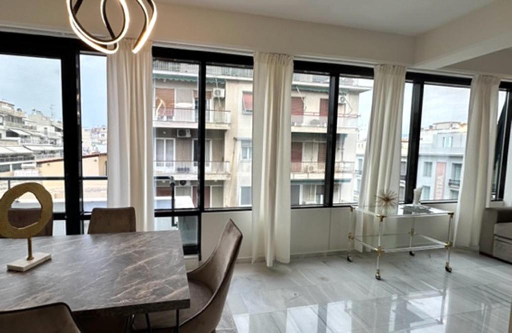 Posezení v ubytování MELMA PROPERTIES - ARIA-Piraeus Central Penthouse
