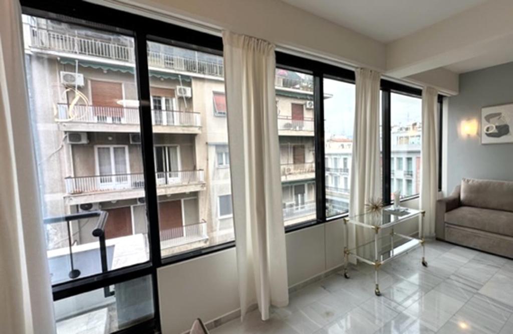 Posezení v ubytování MELMA PROPERTIES - ARIA-Piraeus Central Penthouse