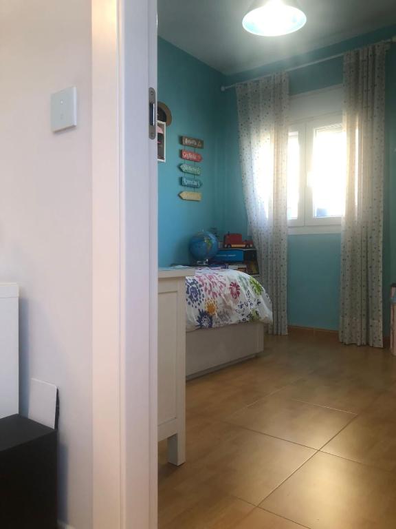 Posteľ alebo postele v izbe v ubytovaní Huelin Playa con Parking cerca Centro