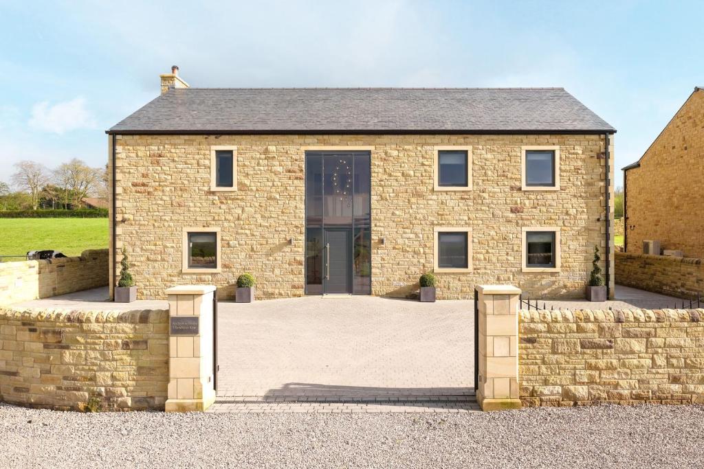 ブラックバーンにあるArchstone Houseのレンガ造りの家