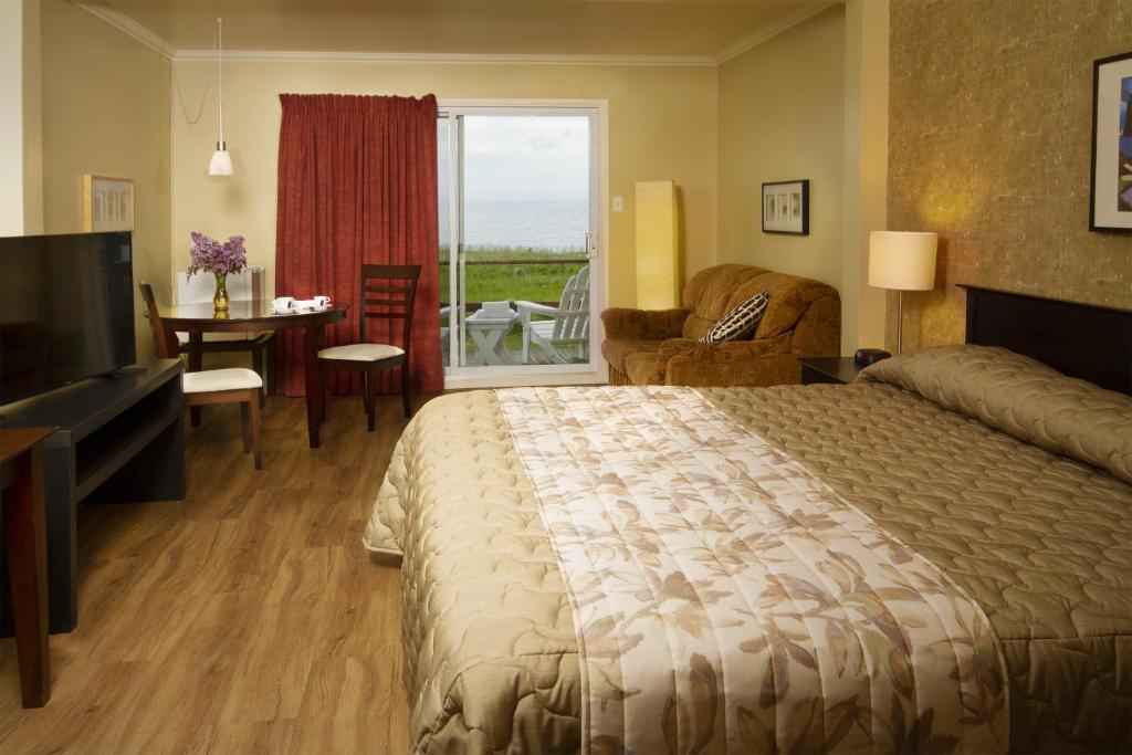 Postel nebo postele na pokoji v ubytování Hotel Motel Belle Plage