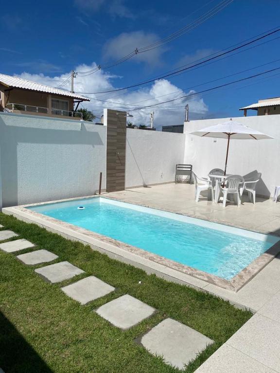Bazén v ubytování Casa Completa com piscina, 800m da praia de Jauá nebo v jeho okolí