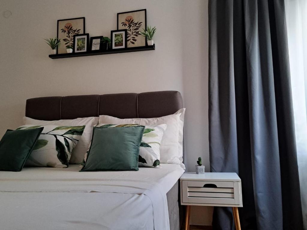 Posteľ alebo postele v izbe v ubytovaní Ocean apartman