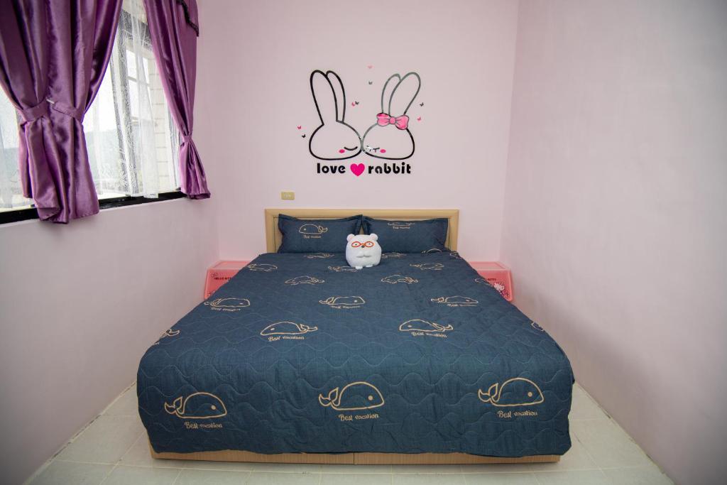 Postel nebo postele na pokoji v ubytování Green Close House Homestay