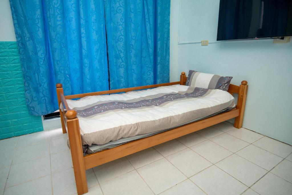 Postel nebo postele na pokoji v ubytování Green Close House Homestay