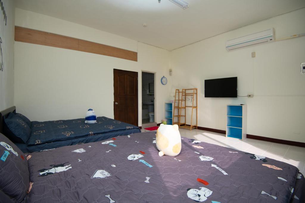 TV a/nebo společenská místnost v ubytování Green Close House Homestay