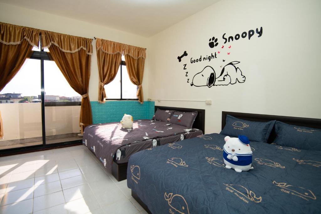 Postel nebo postele na pokoji v ubytování Green Close House Homestay