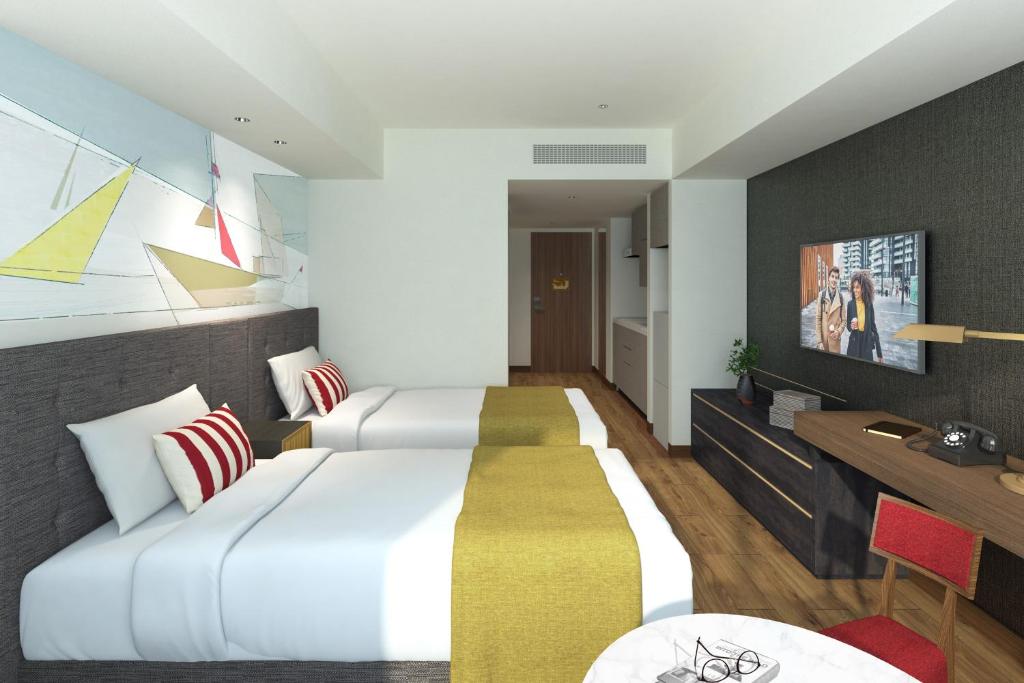TV a/nebo společenská místnost v ubytování Citadines Harbour Front Yokohama