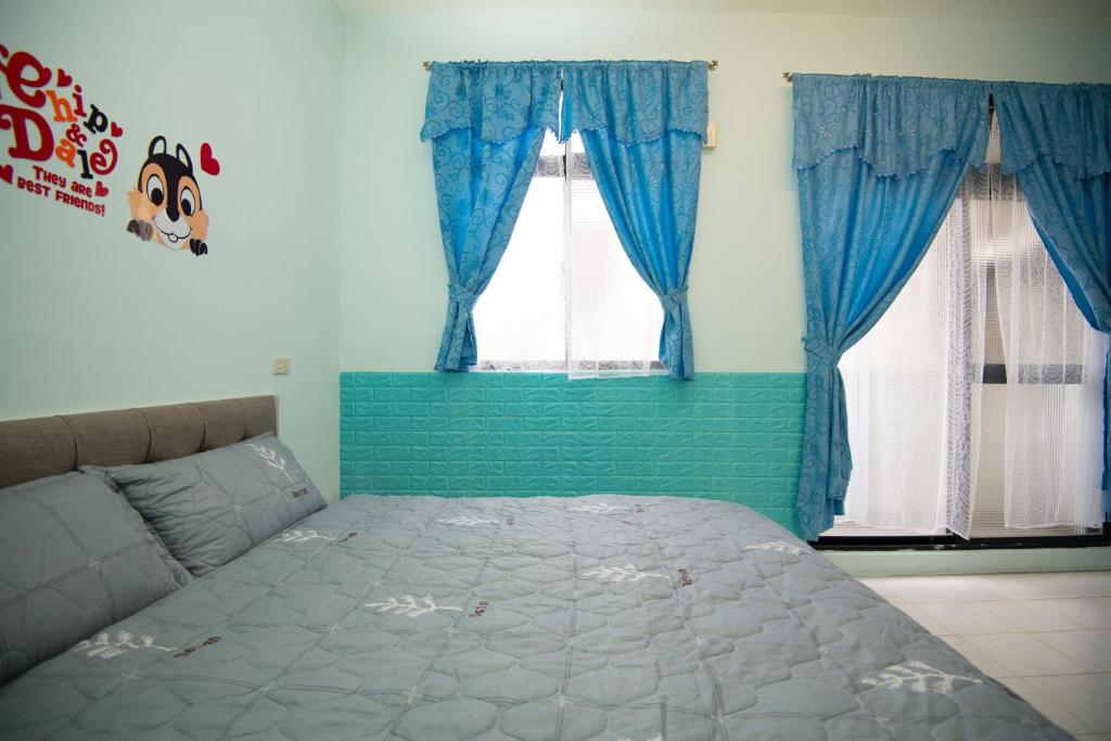 Postel nebo postele na pokoji v ubytování Green Close House Homestay