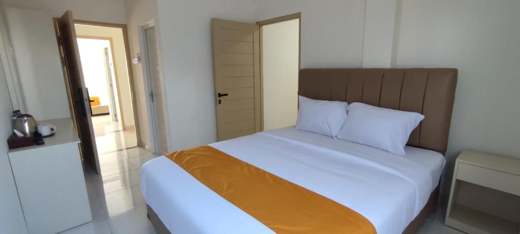 Postel nebo postele na pokoji v ubytování Batik Oma House