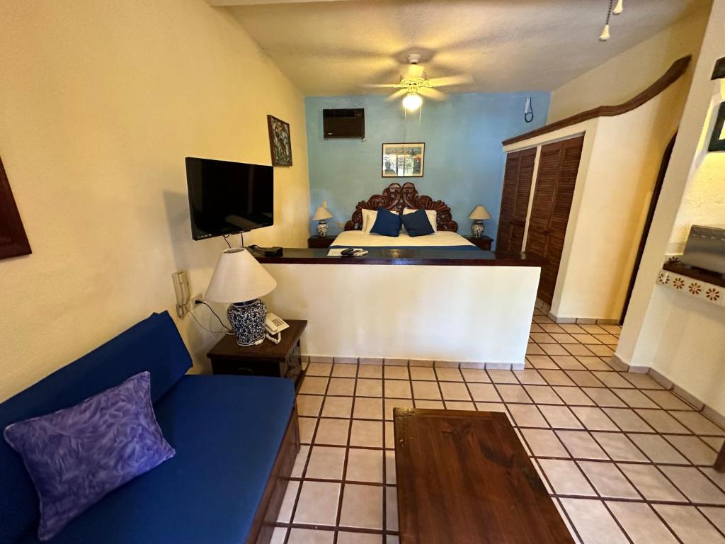 TV a/nebo společenská místnost v ubytování Vallarta Sun Suites