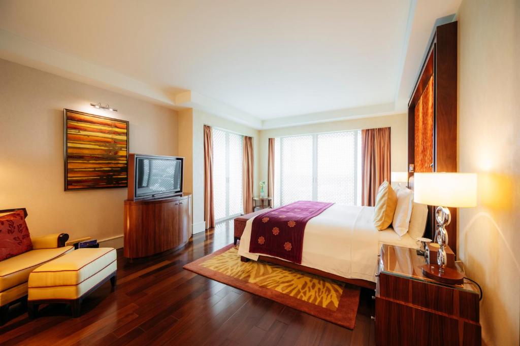 Postel nebo postele na pokoji v ubytování The Ritz - Carlton, Bangalore