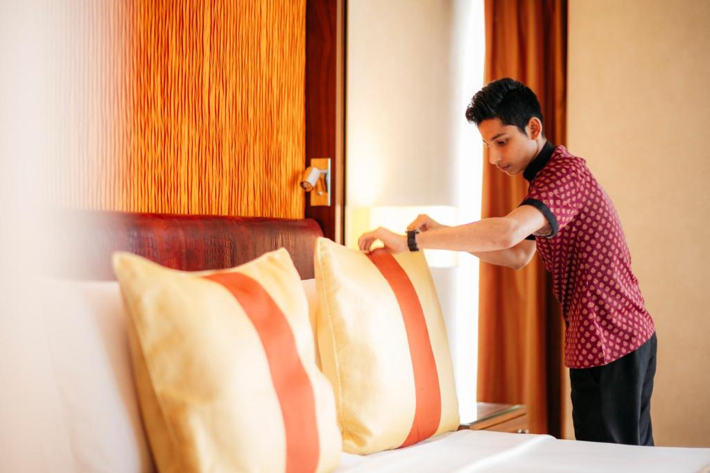 Postel nebo postele na pokoji v ubytování The Ritz - Carlton, Bangalore