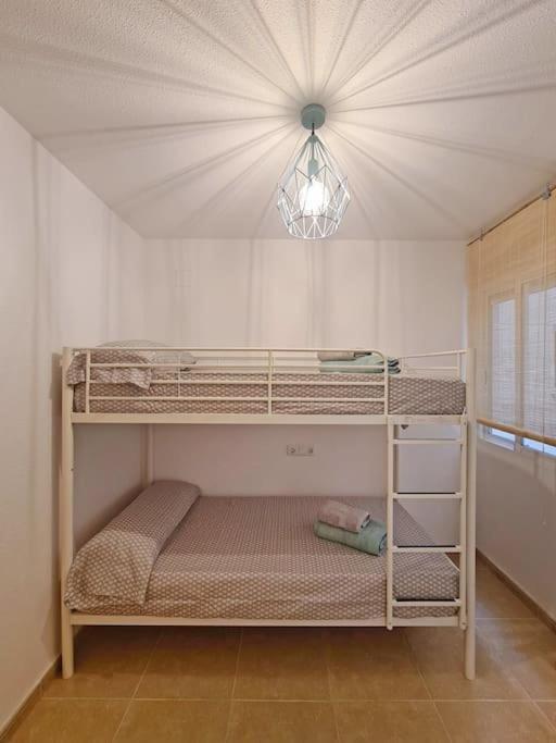 Posteľ alebo postele v izbe v ubytovaní Family Apartment with Sea View by NRAS