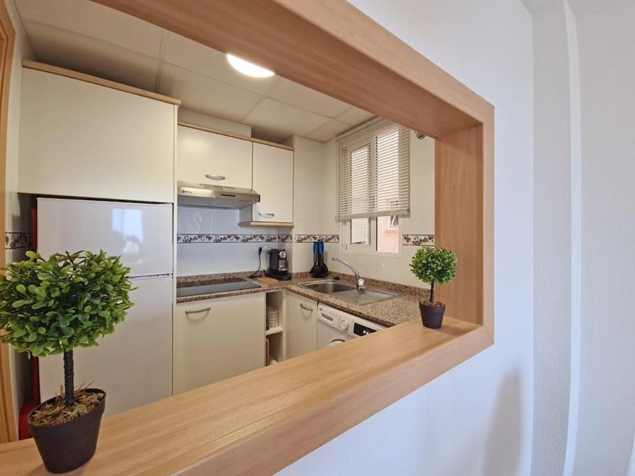 Kuchyňa alebo kuchynka v ubytovaní Family Apartment with Sea View by NRAS