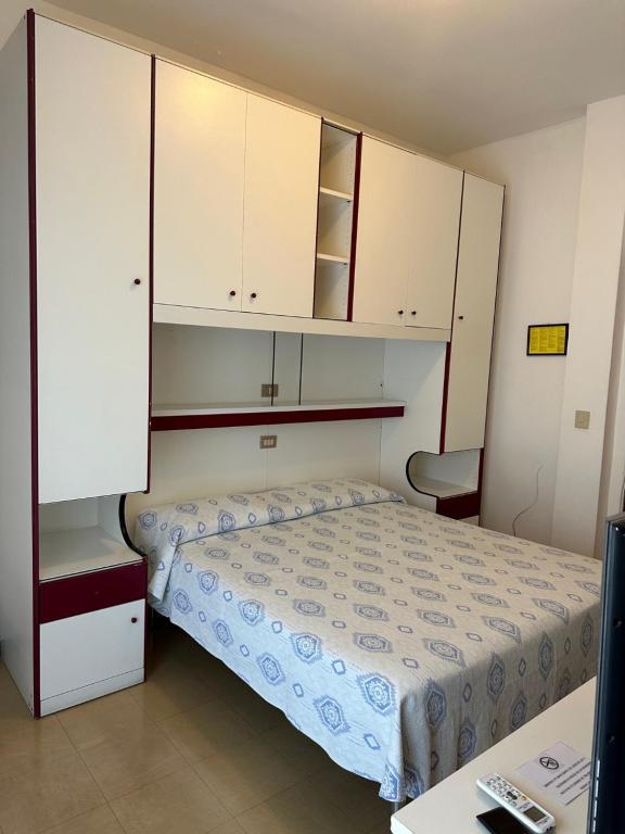 Postel nebo postele na pokoji v ubytování Hotel Reno