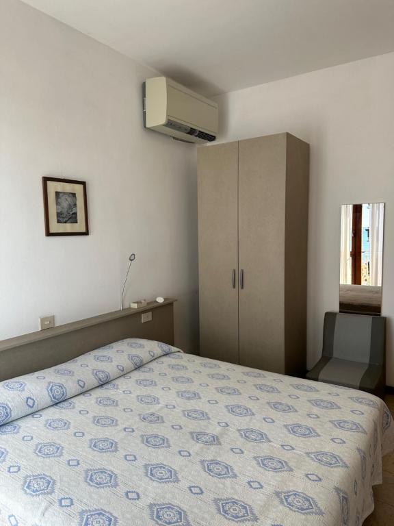 Postel nebo postele na pokoji v ubytování Hotel Reno