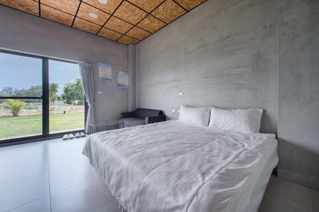 Postel nebo postele na pokoji v ubytování Sun Island