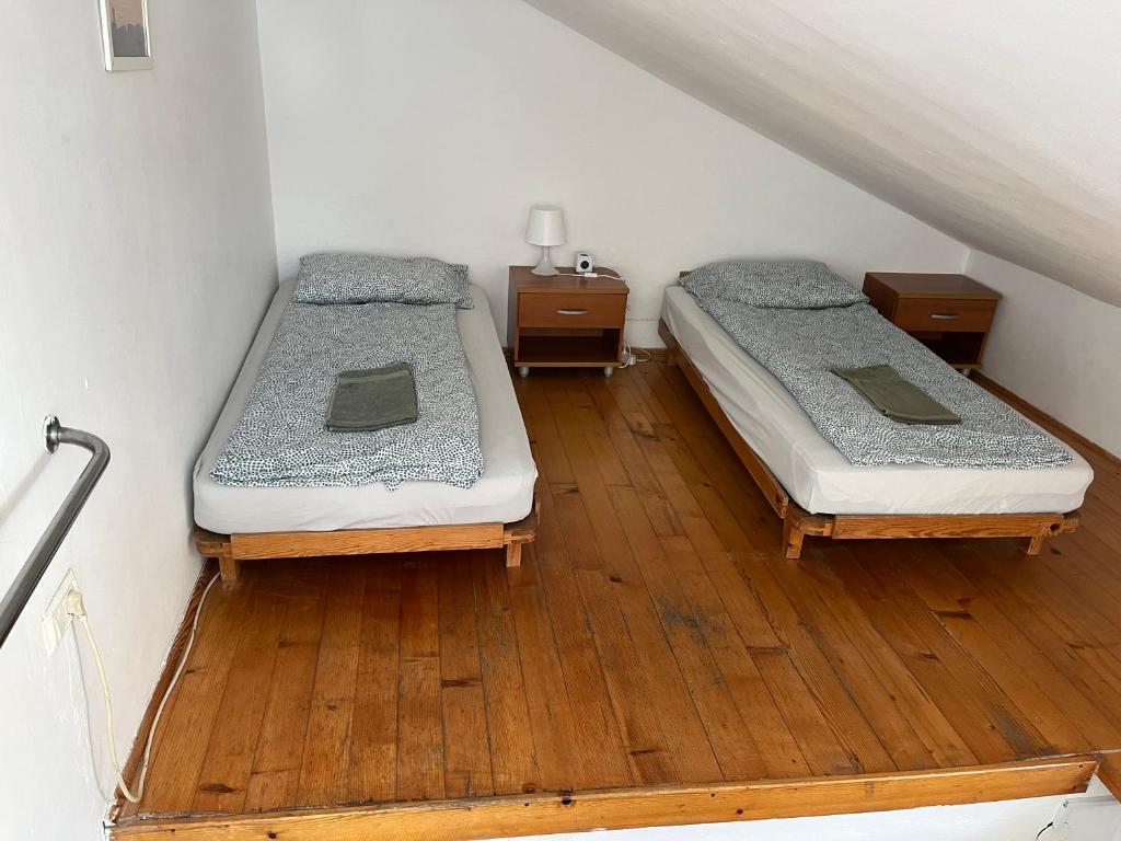 Postel nebo postele na pokoji v ubytování Hostel Piran