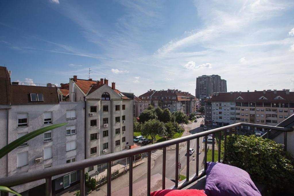 Balkón nebo terasa v ubytování Penthouse apartment with private parking