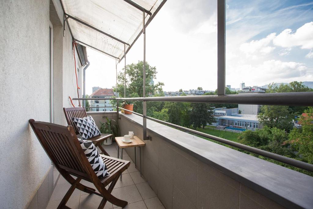 Balkón nebo terasa v ubytování Penthouse apartment with private parking