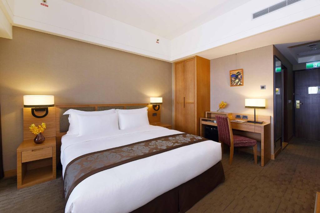 Postel nebo postele na pokoji v ubytování Fullon Hotel Hualien