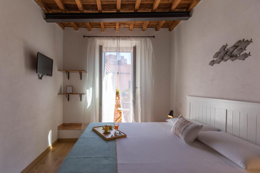 Postel nebo postele na pokoji v ubytování Indarsena b&b