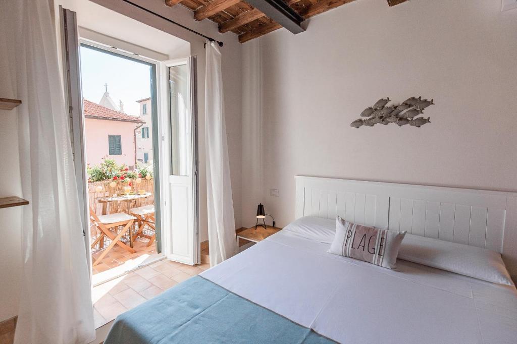 Postel nebo postele na pokoji v ubytování Indarsena b&b
