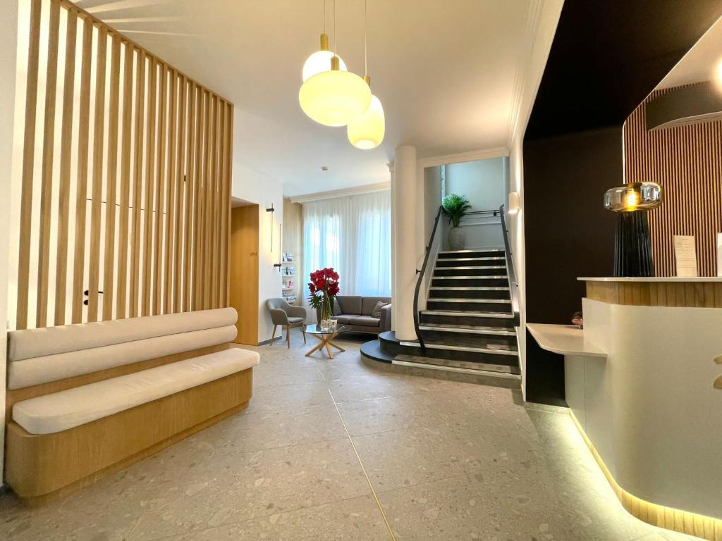 Posezení v ubytování Hôtel Les Deux Coteaux