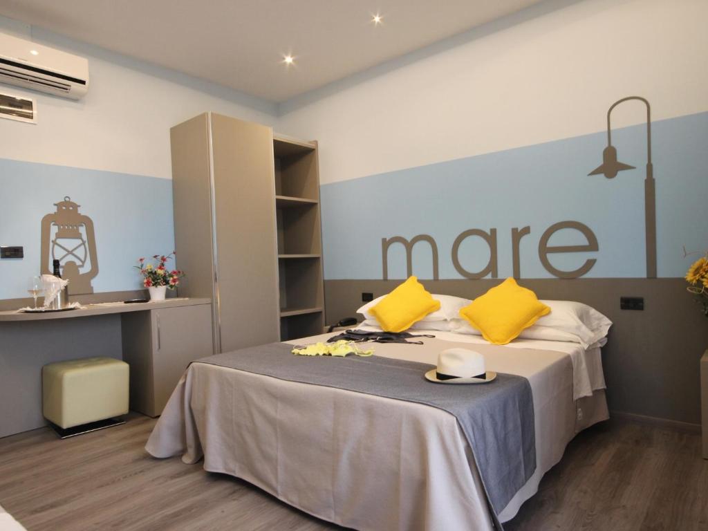 Postel nebo postele na pokoji v ubytování Hotel Arabel
