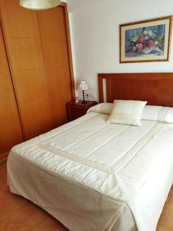 Posteľ alebo postele v izbe v ubytovaní Apartamento tranquilo con 3 dormitorios