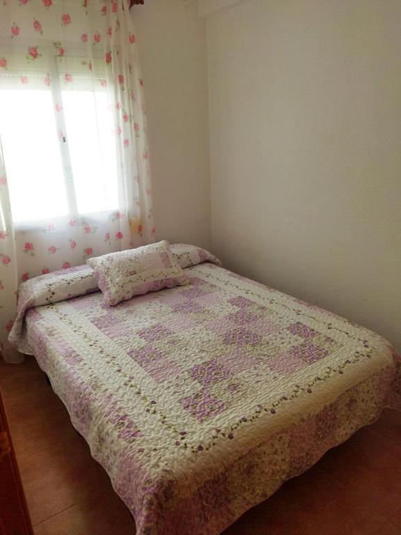 Posteľ alebo postele v izbe v ubytovaní Apartamento tranquilo con 3 dormitorios