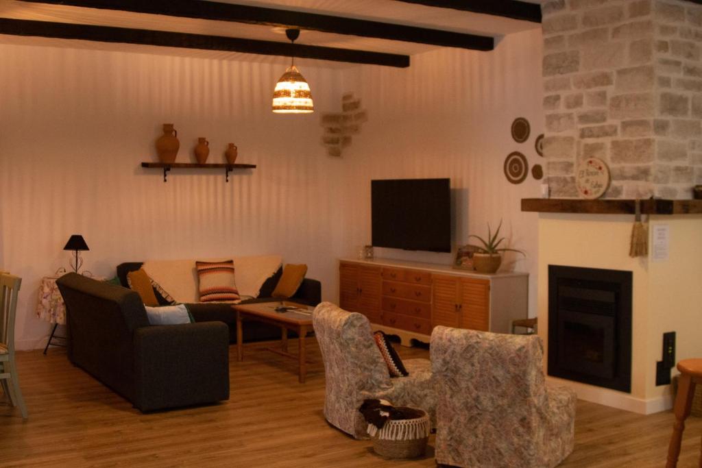 TV a/nebo společenská místnost v ubytování Casa Rural VUT El Rincón de Eulogio